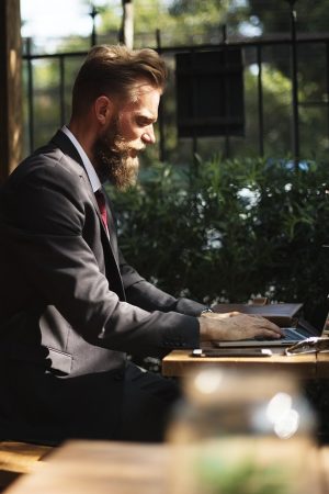 beard, business, business people, cafe, coffee shop, communication, connection, corporate, internet, laptop, man, online, person, suit, table, typing, working, business, business, business, business, business, corporate, corporate, corporate, corporate, typing